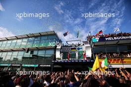 The podium Lewis Hamilton (GBR) Mercedes AMG F1, second; Sebastian Vettel (GER) Ferrari, race winner; Valtteri Bottas (FIN) Mercedes AMG F1, third. 26.03.2017. Formula 1 World Championship, Rd 1, Australian Grand Prix, Albert Park, Melbourne, Australia, Race Day.