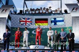 The podium (L to R): Lewis Hamilton (GBR) Mercedes AMG F1, second; Sebastian Vettel (GER) Ferrari, race winner; Valtteri Bottas (FIN) Mercedes AMG F1, third. 26.03.2017. Formula 1 World Championship, Rd 1, Australian Grand Prix, Albert Park, Melbourne, Australia, Race Day.