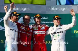 1st place Sebastian Vettel (GER) Ferrari, 2nd Lewis Hamilton (GBR) Mercedes AMG F1 and 3rd place Valtteri Bottas (FIN) Mercedes AMG F1. 26.03.2017. Formula 1 World Championship, Rd 1, Australian Grand Prix, Albert Park, Melbourne, Australia, Race Day.