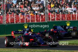 Daniil Kvyat (RUS) Scuderia Toro Rosso STR12 leads team mate Carlos Sainz Jr (ESP) Scuderia Toro Rosso STR12. 26.03.2017. Formula 1 World Championship, Rd 1, Australian Grand Prix, Albert Park, Melbourne, Australia, Race Day.
