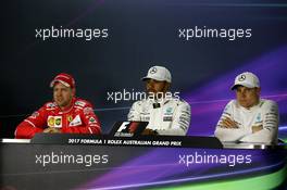 The post qualifying FIA Press Conference (L to R): Sebastian Vettel (GER) Ferrari; Lewis Hamilton (GBR) Mercedes AMG F1; Valtteri Bottas (FIN) Mercedes AMG F1. 25.03.2017. Formula 1 World Championship, Rd 1, Australian Grand Prix, Albert Park, Melbourne, Australia, Qualifying Day.