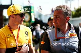 (L to R): Nico Hulkenberg (GER) Renault Sport F1 Team with Mario Isola (ITA) Pirelli Racing Manager. 25.03.2017. Formula 1 World Championship, Rd 1, Australian Grand Prix, Albert Park, Melbourne, Australia, Qualifying Day.