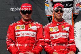 (L to R): Kimi Raikkonen (FIN) Ferrari with team mate Sebastian Vettel (GER) Ferrari at the drivers' start of season group photograph. 26.03.2017. Formula 1 World Championship, Rd 1, Australian Grand Prix, Albert Park, Melbourne, Australia, Race Day.
