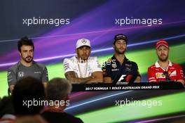 (L to R): Lewis Hamilton (GBR) Mercedes AMG F1; Daniel Ricciardo (AUS) Red Bull Racing; Sebastian Vettel (GER) Ferrari; and Fernando Alonso (ESP) McLaren, in the FIA Press Conference. 23.03.2017. Formula 1 World Championship, Rd 1, Australian Grand Prix, Albert Park, Melbourne, Australia, Preparation Day.