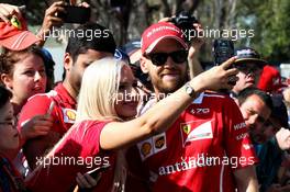 Sebastian Vettel (GER) Ferrari with fans. 23.03.2017. Formula 1 World Championship, Rd 1, Australian Grand Prix, Albert Park, Melbourne, Australia, Preparation Day.