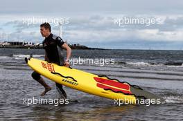 Daniil Kvyat (RUS) Scuderia Toro Rosso on St Kilda Beach with the St Kilda Lifesaving Club. 22.03.2017. Formula 1 World Championship, Rd 1, Australian Grand Prix, Albert Park, Melbourne, Australia, Preparation Day.