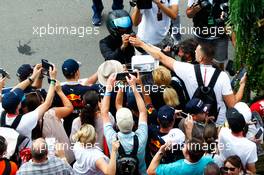 Lewis Hamilton (GBR) Mercedes AMG F1 signs autographs for the fans. 08.07.2017. Formula 1 World Championship, Rd 9, Austrian Grand Prix, Spielberg, Austria, Qualifying Day.