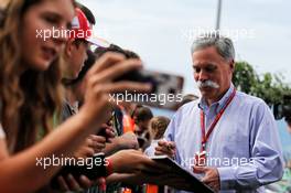 Chase Carey (USA) Formula One Group Chairman signs autographs for the fans. 08.07.2017. Formula 1 World Championship, Rd 9, Austrian Grand Prix, Spielberg, Austria, Qualifying Day.