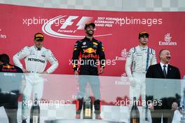 The podium (L to R): Valtteri Bottas (FIN) Mercedes AMG F1, second; Daniel Ricciardo (AUS) Red Bull Racing, race winner; Lance Stroll (CDN) Williams, third. 25.06.2017. Formula 1 World Championship, Rd 8, Azerbaijan Grand Prix, Baku Street Circuit, Azerbaijan, Race Day.