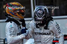 (L to R): Lewis Hamilton (GBR) Mercedes AMG F1 celebrates his pole position in parc ferme with second placed team mate Valtteri Bottas (FIN) Mercedes AMG F1. 24.06.2017. Formula 1 World Championship, Rd 8, Azerbaijan Grand Prix, Baku Street Circuit, Azerbaijan, Qualifying Day.