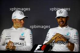 (L to R): Valtteri Bottas (FIN) Mercedes AMG F1 and team mate Lewis Hamilton (GBR) Mercedes AMG F1 in the post qualifying FIA Press Conference. 24.06.2017. Formula 1 World Championship, Rd 8, Azerbaijan Grand Prix, Baku Street Circuit, Azerbaijan, Qualifying Day.