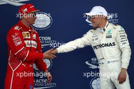 Kimi Raikkonen (FIN) Ferrari SF70H and Valtteri Bottas (FIN) Mercedes AMG F1. 24.06.2017. Formula 1 World Championship, Rd 8, Azerbaijan Grand Prix, Baku Street Circuit, Azerbaijan, Qualifying Day.