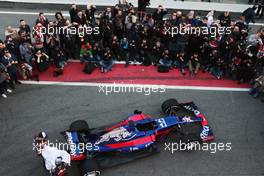 Daniil Kvyat (RUS) Scuderia Toro Rosso and team mate Carlos Sainz Jr (ESP) Scuderia Toro Rosso unveil the Scuderia Toro Rosso STR12. 26.02.2017. Formula One Testing, Preparations, Barcelona, Spain. Sunday.