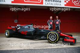 (L to R): Kevin Magnussen (DEN) Haas F1 Team and team mate Romain Grosjean (FRA) Haas F1 Team unveil the Haas VF-17. 27.02.2017. Formula One Testing, Day One, Barcelona, Spain. Monday.