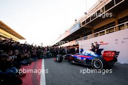 (L to R): Carlos Sainz Jr (ESP) Scuderia Toro Rosso with Daniil Kvyat (RUS) Scuderia Toro Rosso and the Scuderia Toro Rosso STR12. 26.02.2017. Formula One Testing, Preparations, Barcelona, Spain. Sunday.