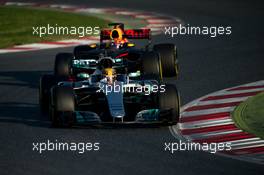 Lewis Hamilton (GBR) Mercedes AMG F1 W08 leads Max Verstappen (NLD) Red Bull Racing RB13. 10.03.2017. Formula One Testing, Day Four, Barcelona, Spain. Friday.