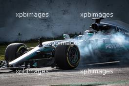 Valtteri Bottas (FIN) Mercedes AMG F1 W08 locks up under braking. 07.03.2017. Formula One Testing, Day One, Barcelona, Spain. Tuesday.