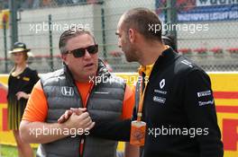 Zak Brown (USA) McLaren Executive Director and  Cyril Abiteboul (FRA) Renault Sport F1 Managing Director. 27.08.2017. Formula 1 World Championship, Rd 12, Belgian Grand Prix, Spa Francorchamps, Belgium, Race Day.