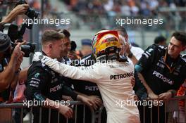 Lewis Hamilton (GBR) Mercedes AMG F1 W08 celebrates with his team. 27.08.2017. Formula 1 World Championship, Rd 12, Belgian Grand Prix, Spa Francorchamps, Belgium, Race Day.