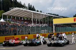 (L to R): Sebastian Vettel (GER) Ferrari SF70H; Lewis Hamilton (GBR) Mercedes AMG F1 W08; and Valtteri Bottas (FIN) Mercedes AMG F1 W08 in qualifying parc ferme. 26.08.2017. Formula 1 World Championship, Rd 12, Belgian Grand Prix, Spa Francorchamps, Belgium, Qualifying Day.