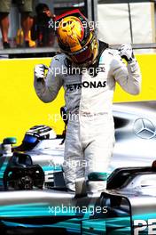 Lewis Hamilton (GBR) Mercedes AMG F1 W08 celebrates his pole position in qualifying parc ferme. 26.08.2017. Formula 1 World Championship, Rd 12, Belgian Grand Prix, Spa Francorchamps, Belgium, Qualifying Day.