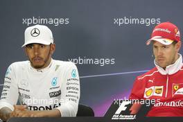 (L to R): Lewis Hamilton (GBR) Mercedes AMG F1 and Sebastian Vettel (GER) Ferrari in the FIA Press Conference. 16.04.2017. Formula 1 World Championship, Rd 3, Bahrain Grand Prix, Sakhir, Bahrain, Race Day.