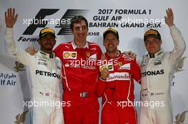 1st place for Sebastian Vettel (GER) Ferrari SF70H, 2nd for Lewis Hamilton (GBR) Mercedes AMG F1 W08 and 3rd for Valtteri Bottas (FIN) Mercedes AMG F1 W08. 16.04.2017. Formula 1 World Championship, Rd 3, Bahrain Grand Prix, Sakhir, Bahrain, Race Day.