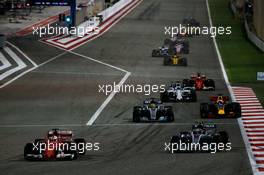 Sebastian Vettel (GER) Ferrari SF70H leads Valtteri Bottas (FIN) Mercedes AMG F1 W08 at the restart. 16.04.2017. Formula 1 World Championship, Rd 3, Bahrain Grand Prix, Sakhir, Bahrain, Race Day.