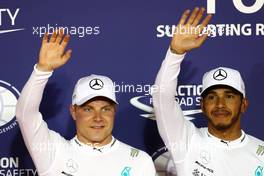 Valtteri Bottas (FIN) Mercedes AMG F1 and Lewis Hamilton (GBR) Mercedes AMG F1   15.04.2017. Formula 1 World Championship, Rd 3, Bahrain Grand Prix, Sakhir, Bahrain, Qualifying Day.