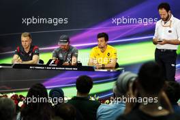 (L to R): Kevin Magnussen (DEN) Haas F1 Team; Fernando Alonso (ESP) McLaren; and Jolyon Palmer (GBR) Renault Sport F1 Team, in the FIA Press Conference. 13.04.2017. Formula 1 World Championship, Rd 3, Bahrain Grand Prix, Sakhir, Bahrain, Preparation Day.