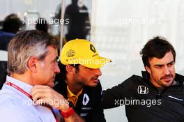 (L to R): Carlos Sainz (ESP) with Carlos Sainz Jr (ESP) Renault Sport F1 Team and Fernando Alonso (ESP) McLaren. 10.11.2017. Formula 1 World Championship, Rd 19, Brazilian Grand Prix, Sao Paulo, Brazil, Practice Day.