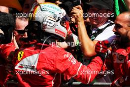 Race winner Sebastian Vettel (GER) Ferrari celebrates with the team in parc ferme. 12.11.2017. Formula 1 World Championship, Rd 19, Brazilian Grand Prix, Sao Paulo, Brazil, Race Day.