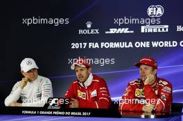 The post trace FIA Press Conference (L to R): Valtteri Bottas (FIN) Mercedes AMG F1 second; Sebastian Vettel (GER) Ferrari, race winner; Kimi Raikkonen (FIN) Ferrari, third. 12.11.2017. Formula 1 World Championship, Rd 19, Brazilian Grand Prix, Sao Paulo, Brazil, Race Day.