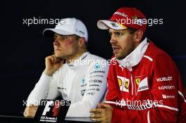 Sebastian Vettel (GER) Ferrari and Valtteri Bottas (FIN) Mercedes AMG F1 in the post race FIA Press Conference. 12.11.2017. Formula 1 World Championship, Rd 19, Brazilian Grand Prix, Sao Paulo, Brazil, Race Day.