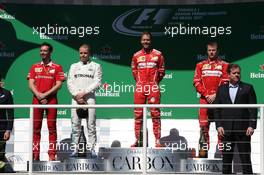 1st place Sebastian Vettel (GER) Ferrari SF70H with 2nd place Valtteri Bottas (FIN) Mercedes AMG F1 W08 and 3rd place Kimi Raikkonen (FIN) Ferrari SF70H. 12.11.2017. Formula 1 World Championship, Rd 19, Brazilian Grand Prix, Sao Paulo, Brazil, Race Day.