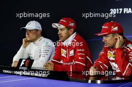 The post race FIA Press Conference (L to R): Valtteri Bottas (FIN) Mercedes AMG F1 second; Sebastian Vettel (GER) Ferrari, race winner; Kimi Raikkonen (FIN) Ferrari, third. 12.11.2017. Formula 1 World Championship, Rd 19, Brazilian Grand Prix, Sao Paulo, Brazil, Race Day.