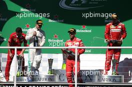 1st place Sebastian Vettel (GER) Ferrari SF70H with 2nd place Valtteri Bottas (FIN) Mercedes AMG F1 W08 and 3rd place Kimi Raikkonen (FIN) Ferrari SF70H. 12.11.2017. Formula 1 World Championship, Rd 19, Brazilian Grand Prix, Sao Paulo, Brazil, Race Day.