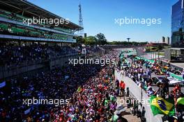 Fans on the circuit at the podium. 12.11.2017. Formula 1 World Championship, Rd 19, Brazilian Grand Prix, Sao Paulo, Brazil, Race Day.