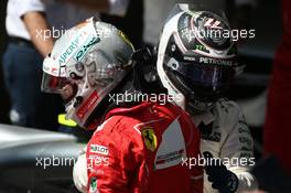 1st place Sebastian Vettel (GER) Ferrari SF70H and 2nd place Valtteri Bottas (FIN) Mercedes AMG F1 W08. 12.11.2017. Formula 1 World Championship, Rd 19, Brazilian Grand Prix, Sao Paulo, Brazil, Race Day.
