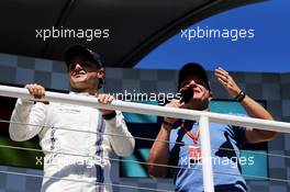 (L to R): Felipe Massa (BRA) Williams on the podium with Rubens Barrichello (BRA). 12.11.2017. Formula 1 World Championship, Rd 19, Brazilian Grand Prix, Sao Paulo, Brazil, Race Day.