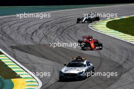 Sebastian Vettel (GER) Ferrari SF70H leads behind the FIA Safety Car. 12.11.2017. Formula 1 World Championship, Rd 19, Brazilian Grand Prix, Sao Paulo, Brazil, Race Day.