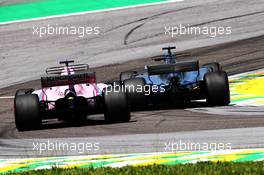 Sergio Perez (MEX) Sahara Force India F1 VJM10 and Lewis Hamilton (GBR) Mercedes AMG F1 W08 battle for position. 12.11.2017. Formula 1 World Championship, Rd 19, Brazilian Grand Prix, Sao Paulo, Brazil, Race Day.