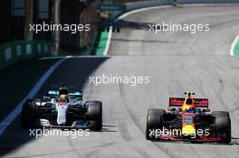 (L to R): Lewis Hamilton (GBR) Mercedes AMG F1 W08 and Max Verstappen (NLD) Red Bull Racing RB13 battle for position. 12.11.2017. Formula 1 World Championship, Rd 19, Brazilian Grand Prix, Sao Paulo, Brazil, Race Day.
