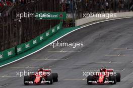 (L to R): Sebastian Vettel (GER) Ferrari SF70H and Kimi Raikkonen (FIN) Ferrari SF70H on the grid at the end of qualifying. 11.11.2017. Formula 1 World Championship, Rd 19, Brazilian Grand Prix, Sao Paulo, Brazil, Qualifying Day.