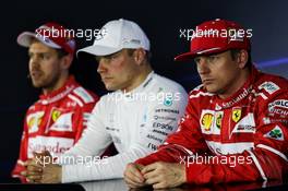 Kimi Raikkonen (FIN) Ferrari with Sebastian Vettel (GER) Ferrari and Valtteri Bottas (FIN) Mercedes AMG F1 in the post qualifying FIA Press Conference. 11.11.2017. Formula 1 World Championship, Rd 19, Brazilian Grand Prix, Sao Paulo, Brazil, Qualifying Day.