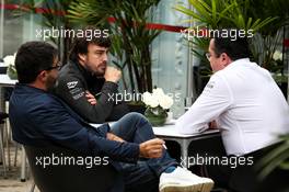 Fernando Alonso (ESP) McLaren with Luis Garcia Abad (ESP) Driver Manager (Left) and Eric Boullier (FRA) McLaren Racing Director (Right). 11.11.2017. Formula 1 World Championship, Rd 19, Brazilian Grand Prix, Sao Paulo, Brazil, Qualifying Day.