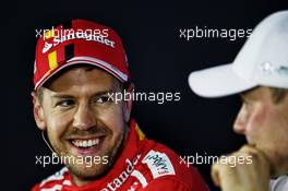 Sebastian Vettel (GER) Ferrari with Valtteri Bottas (FIN) Mercedes AMG F1 in the post qualifying FIA Press Conference. 11.11.2017. Formula 1 World Championship, Rd 19, Brazilian Grand Prix, Sao Paulo, Brazil, Qualifying Day.