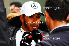 Lewis Hamilton (GBR) Mercedes AMG F1 with the media. 11.11.2017. Formula 1 World Championship, Rd 19, Brazilian Grand Prix, Sao Paulo, Brazil, Qualifying Day.