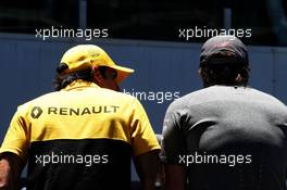 (L to R): Carlos Sainz Jr (ESP) Renault Sport F1 Team with Fernando Alonso (ESP) McLaren on the drivers parade. 12.11.2017. Formula 1 World Championship, Rd 19, Brazilian Grand Prix, Sao Paulo, Brazil, Race Day.