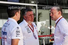 (L to R): Andy Stevenson (GBR) Sahara Force India F1 Team Manager with Otmar Szafnauer (USA) Sahara Force India F1 Chief Operating Officer and Sean Bratches (USA) Formula 1 Managing Director, Commercial Operations. 12.11.2017. Formula 1 World Championship, Rd 19, Brazilian Grand Prix, Sao Paulo, Brazil, Race Day.